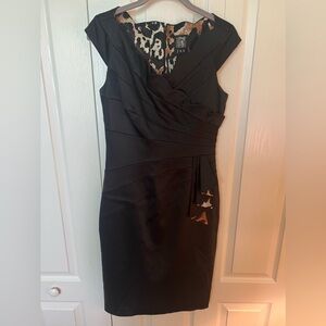 Dress by JAX, size 6 black with splash of color.